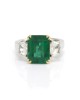 Emerald Cut Emerald with Trapezoid Shaped Diamonds in Platinum and Gold